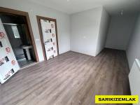 Edremit Kadıköy`de, Nezih Site, İçerisinde, 2+1, Amerikan Mutfak, Bahçe Katı